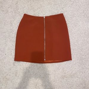 Forever 21 Dark Orange mini skirt with a zipper front